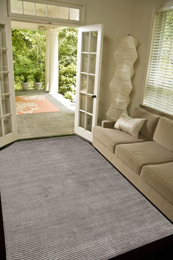 hand-loomed ash gray area rug art silk