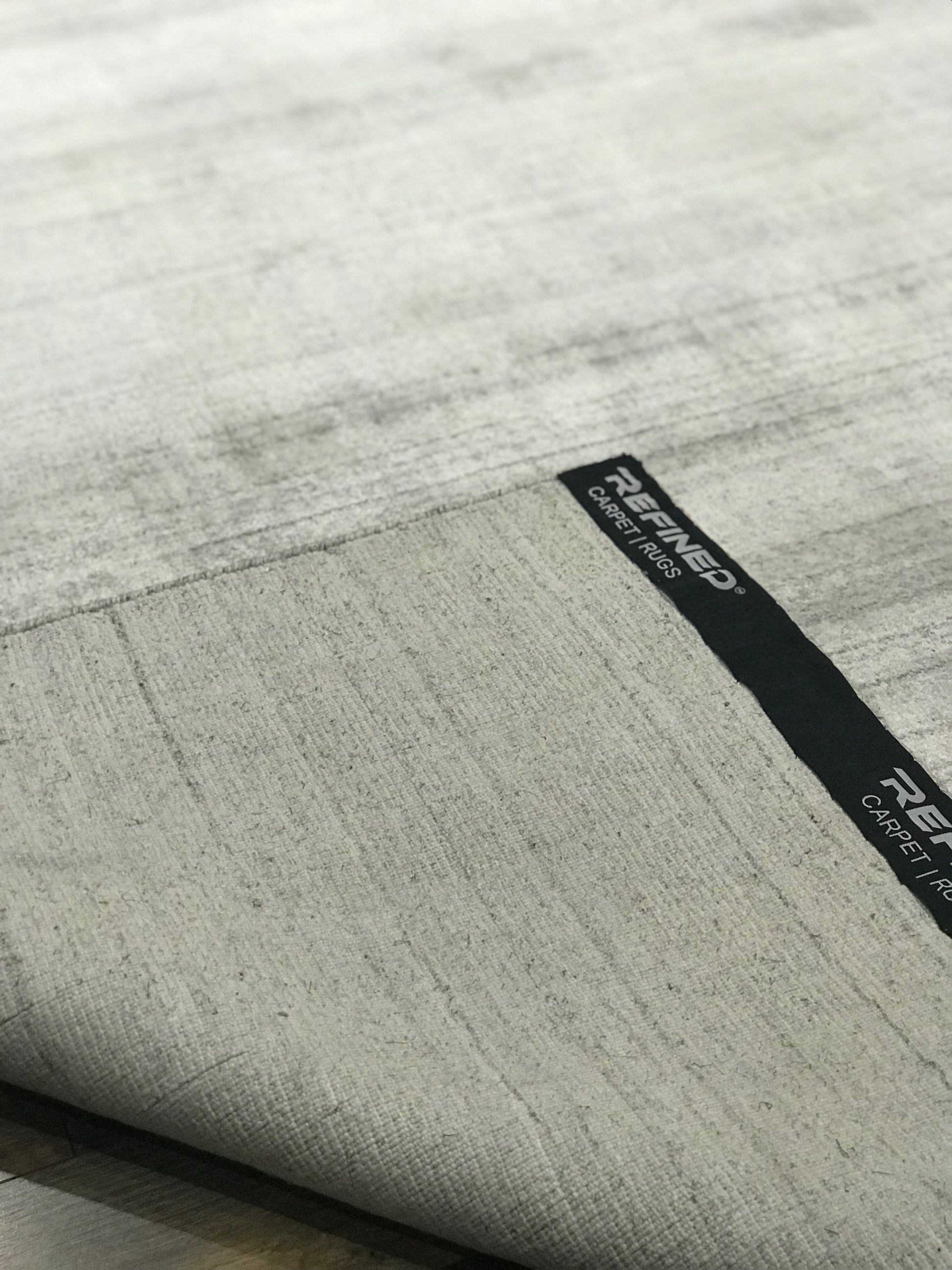 refined area rugs basix collection solid colored wool viscose ivory area rug online affordable handmade hand knotted rug store orange county